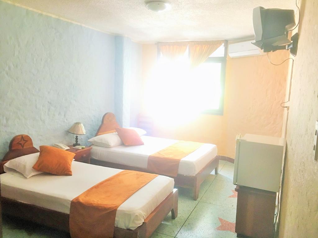 Hostal Estrella De Mar Puerto Ayora  Quarto foto